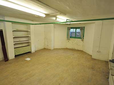 Original basement classroom before renovation
