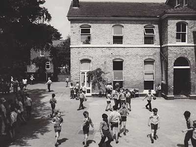 Boys at playtime outside Highbury House